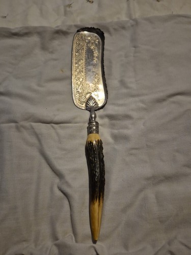 Striking antique crumb scoop - antique,