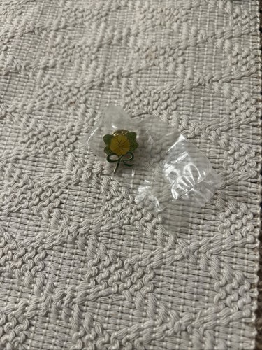 Macmillan yellow flower pin - macmillan,
