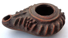 Roman or Roman Style Pottery Lamp measuring approximately 3 1/2 inches in length