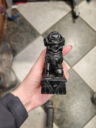 Hand carved black stone - hand,