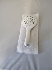 white flat titan shower head