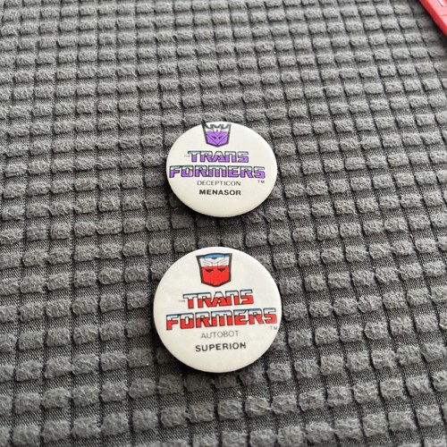 Transformers pin badges - x,