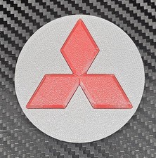 Mitsubishi Shogun Mk4 70mm center caps for 20" Le Mans 111 wheels.