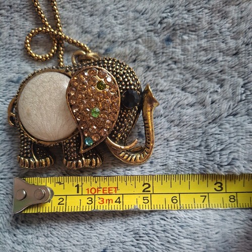 Sparkly gold tone long - tone,