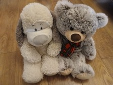 Two Large Teddy Bear With