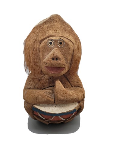 Hand carved tiki coconut - hand,