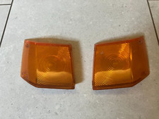 A pair of Toyota Celica TA22 Side Light/Indicator Lenses