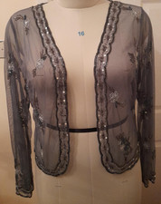 Beaded mesh bolero shaped, edge to edge jacket with long sleeves 