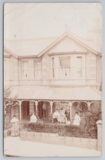 RPPC Edwardian Group on Ornate Balcony House "Belmore" Postmarked 1905