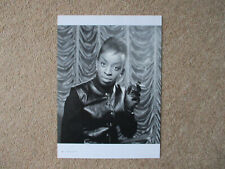 Madeline Bell in black