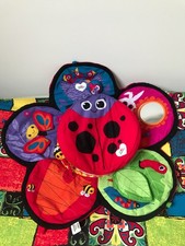 TOMY LAMAZE COLOURFUL LADYBIRD SPIN & EXPLORE TUMMY TIME GARDEN GYM & PLAY MAT