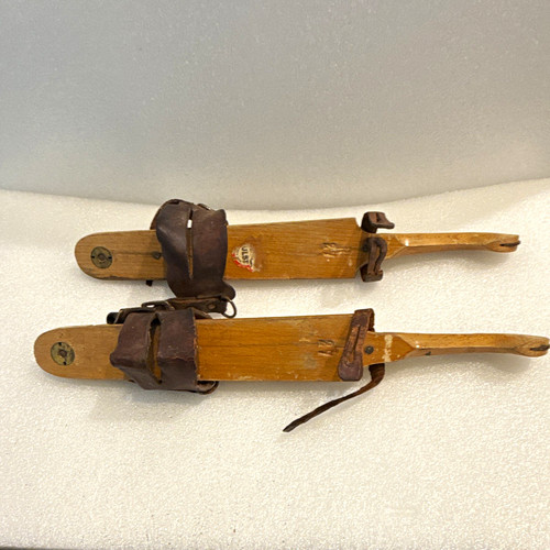 Vintage brown wooden snow skis - wooden,