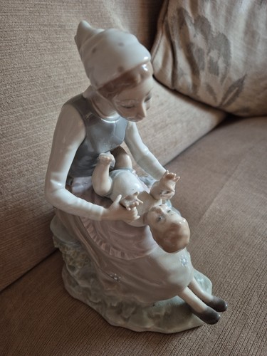 Nao lladro figurine - by,