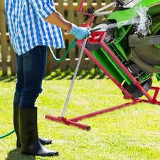 Folding lift for lawn mowers