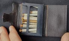 Vintage Doctor's leather travel pouch  with nine labelled glass vials