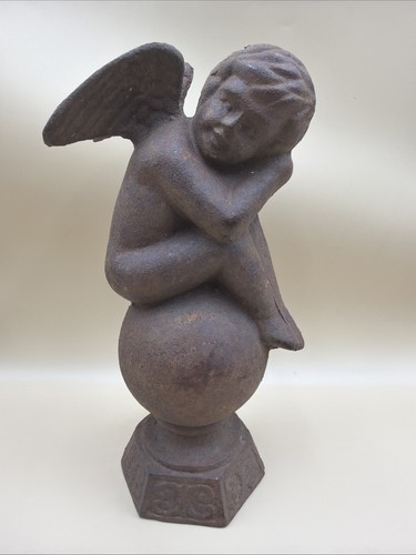 Cast iron cherub - angel, on