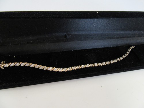 Gold tennis bracelet 375 ct - 9,
