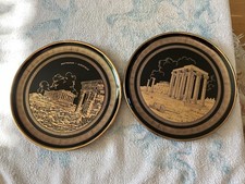 A Pair of Collectible Greek 24