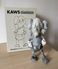 KAWS x Robert Lazzarini Distorted Companion (Grey) + Banksy Stik Dface Sticker