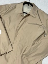 Gianni Feraud , rain coat 
