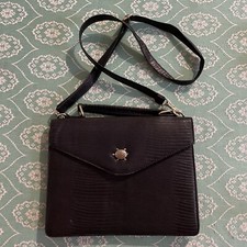 Black Tortoise Handbag. Animal