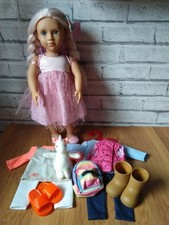 Our Generation Doll 18" tall with extra outfits. Pre-owned.