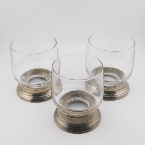 Three pewter mounted - , glasses