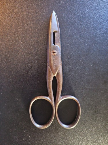 Antique shear co button - shear,