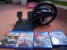 Sony PlayStation 4 Slim 500GB Home Console - Jet Black with steering wheel