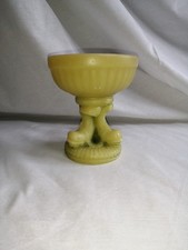 Olive coloured carved soap stone candle holder.