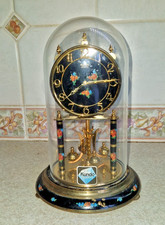 VINTAGE LARGE KUNDO ANNIVERSARY CLOCK WITH BLACK FACE & FLORAL DESIGN