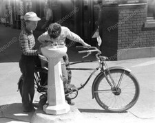 Young Boys & Bike At Water