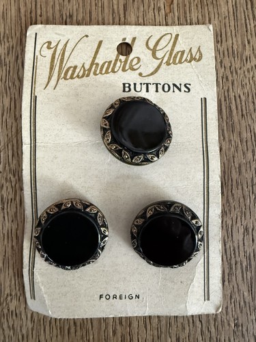Vintage black buttons - x, on