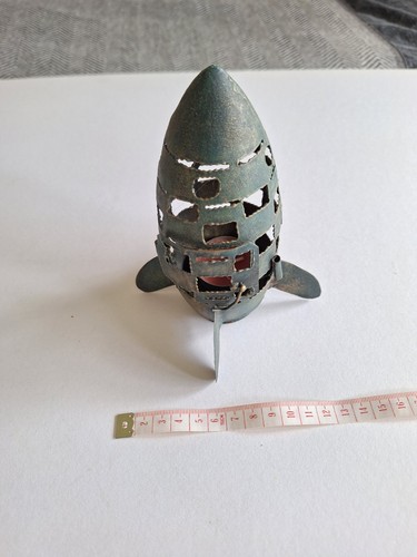 Pierced metal rocket - metal, tea