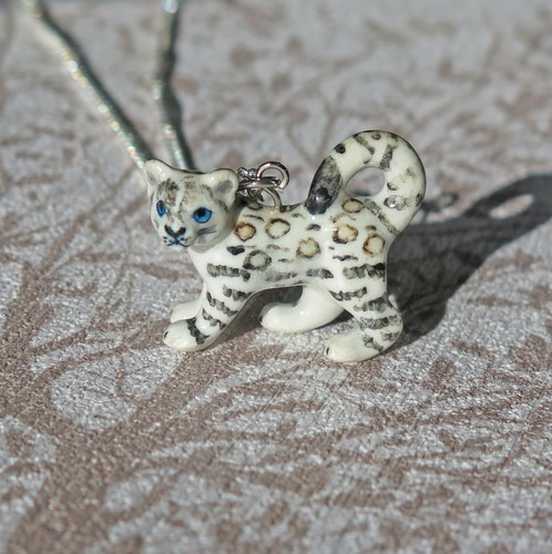 Baby snow leopard porcelain - leopard,