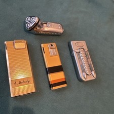 Lot of 4 Vintage Collectible Japan Lighters