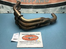 Exhaust manifold muffler
