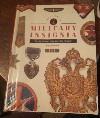 Military insignia hardback new - military,