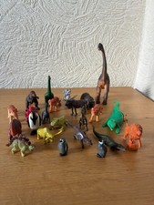 Plastic animals 22 small, varied, all able to stand with no damage