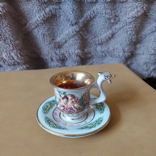 Cherubs cup saucer - cherubs,