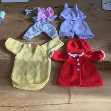 4 Sets Of Dolls Clothes 3 Hand