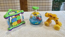 Chicco Aquarium Spinner, Little Tikes Activity Triangle And Hap-P-Kid press dog