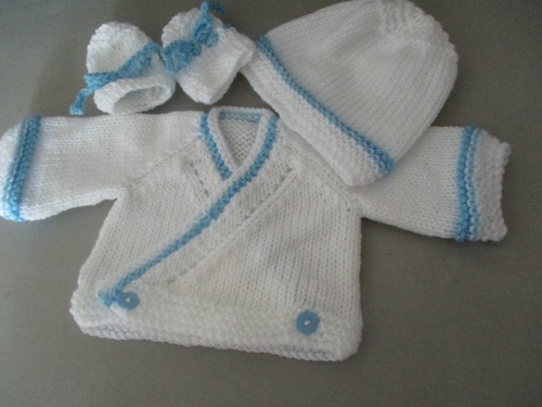 Hand knitted baby - hand,