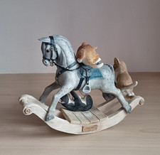 SHERRATT AND SIMPSON KITTENS PLAYING ON ROCKING HORSE