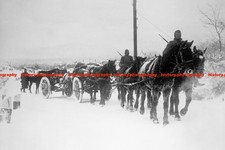 F027680 German soldiers transport equipment and gun with horse drawn cart Easter