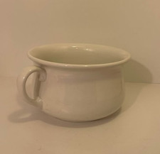 Antique chamber pot. Garden
