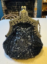 Beaded Heavily evening bag - unusual clasp