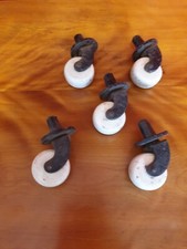 SET OF 5 VICTORIAN CASTORS 