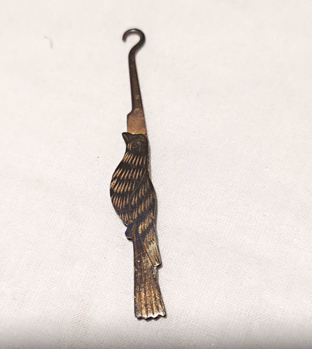 Antique figural glove hook - figural,