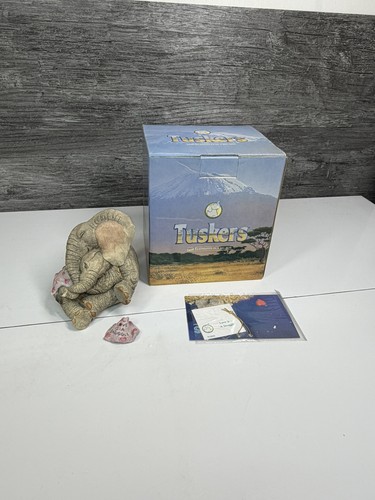 Boxed tuskers love a - boxed,